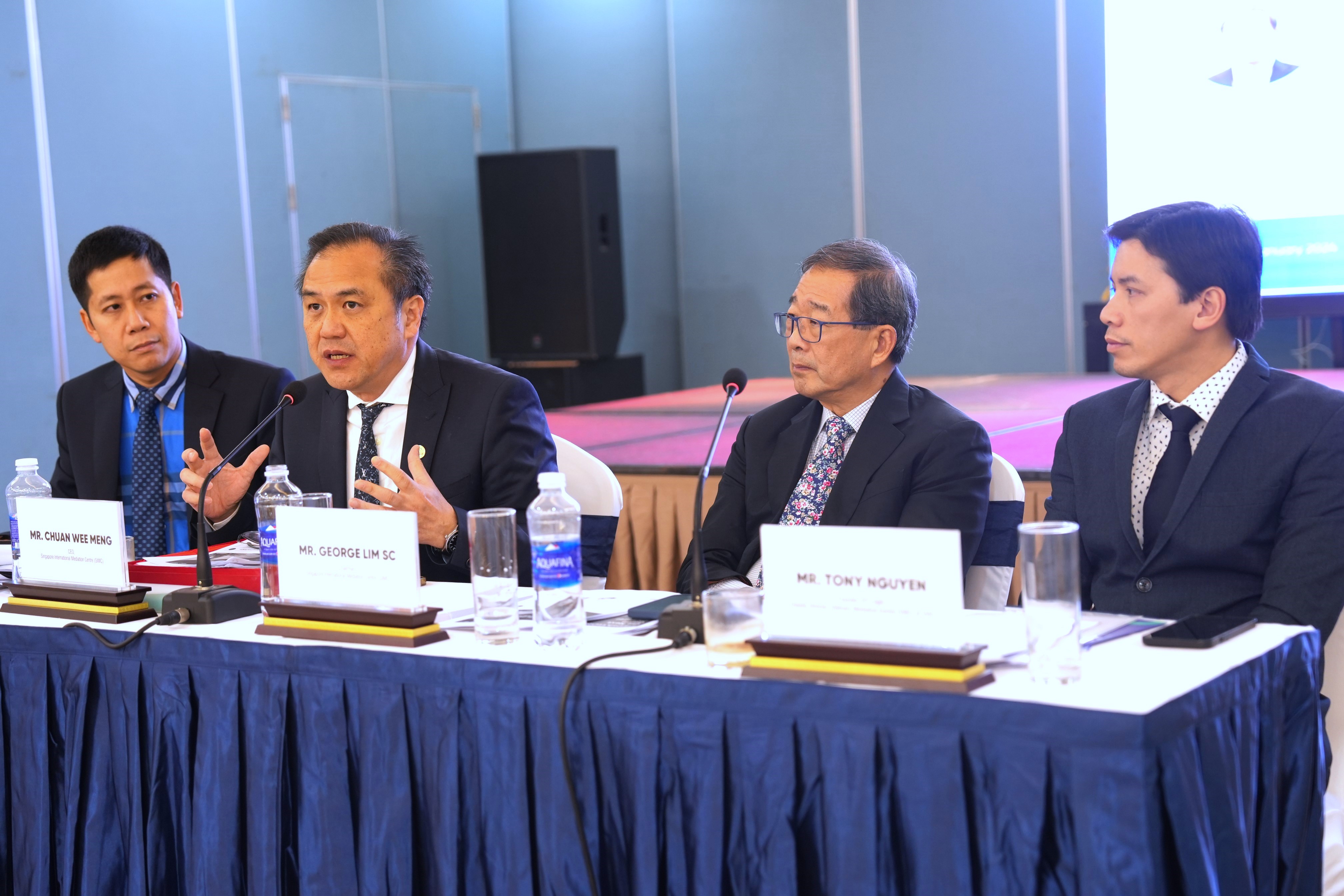 At the event hosted by VMC Hanoi (L-R): Phan Trong Dat, Chuan Wee Meng , George Lim SC, Tony Nguyen